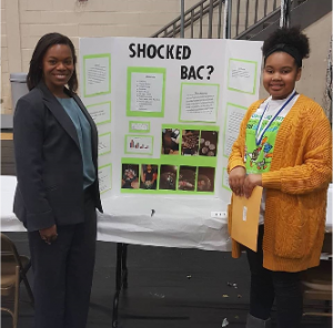 Councilmember Angela Evans with student at 2018 Science Fair