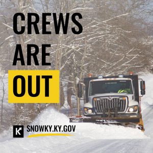 district 7: KYTC logo, says crews are out, big snow truck plowing snow