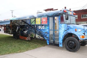 parents: a decorated blue bus