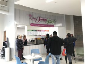 juice bar that says jump start with white walls