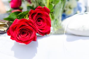 Valentine's Day: red roses on white linen
