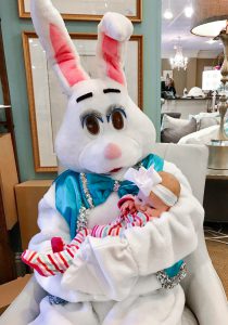Egg Hunt: easter bunny holding a baby in a hospital