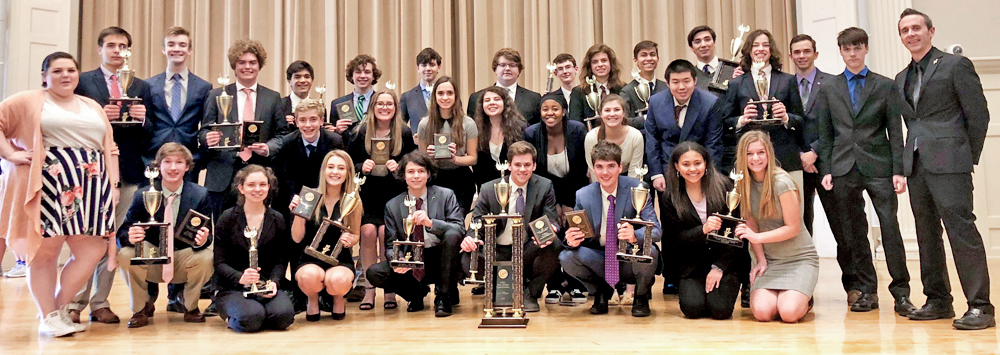 Parents: group of high schoolers posing with tropheys
