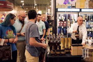 Total Wine: a line of people looking at bourbon