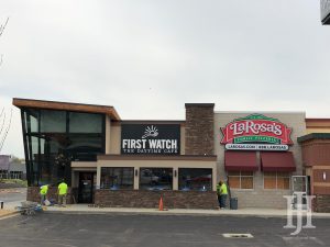 a building that says First Watch and LaRosa's on the front
