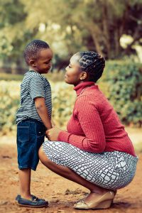 Mother's Day: woman and her son looking at each other