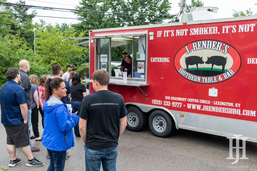 Neighborhood: food truck with people around it