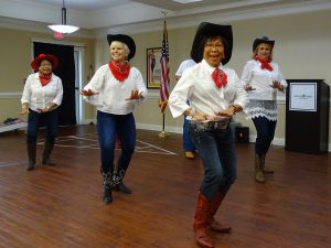 Senior Living: a group of older women dressed like cowgirls and dancing